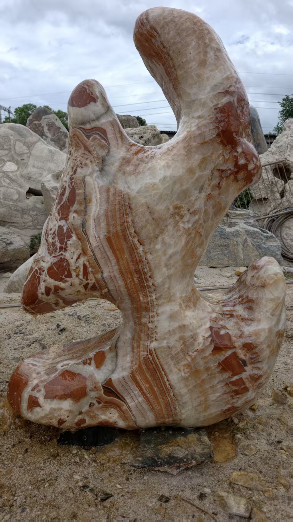 Warm veined sculptural stone