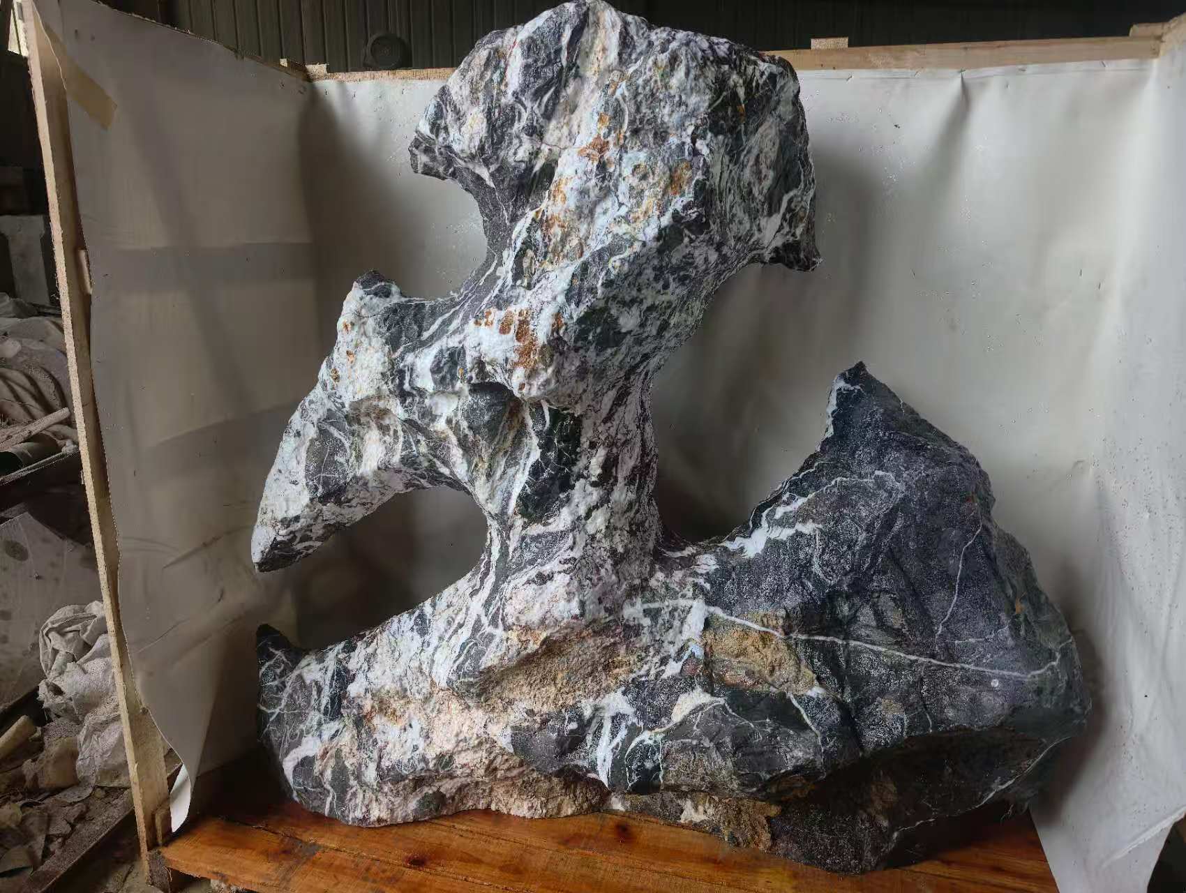 Natural-edged dark display stone