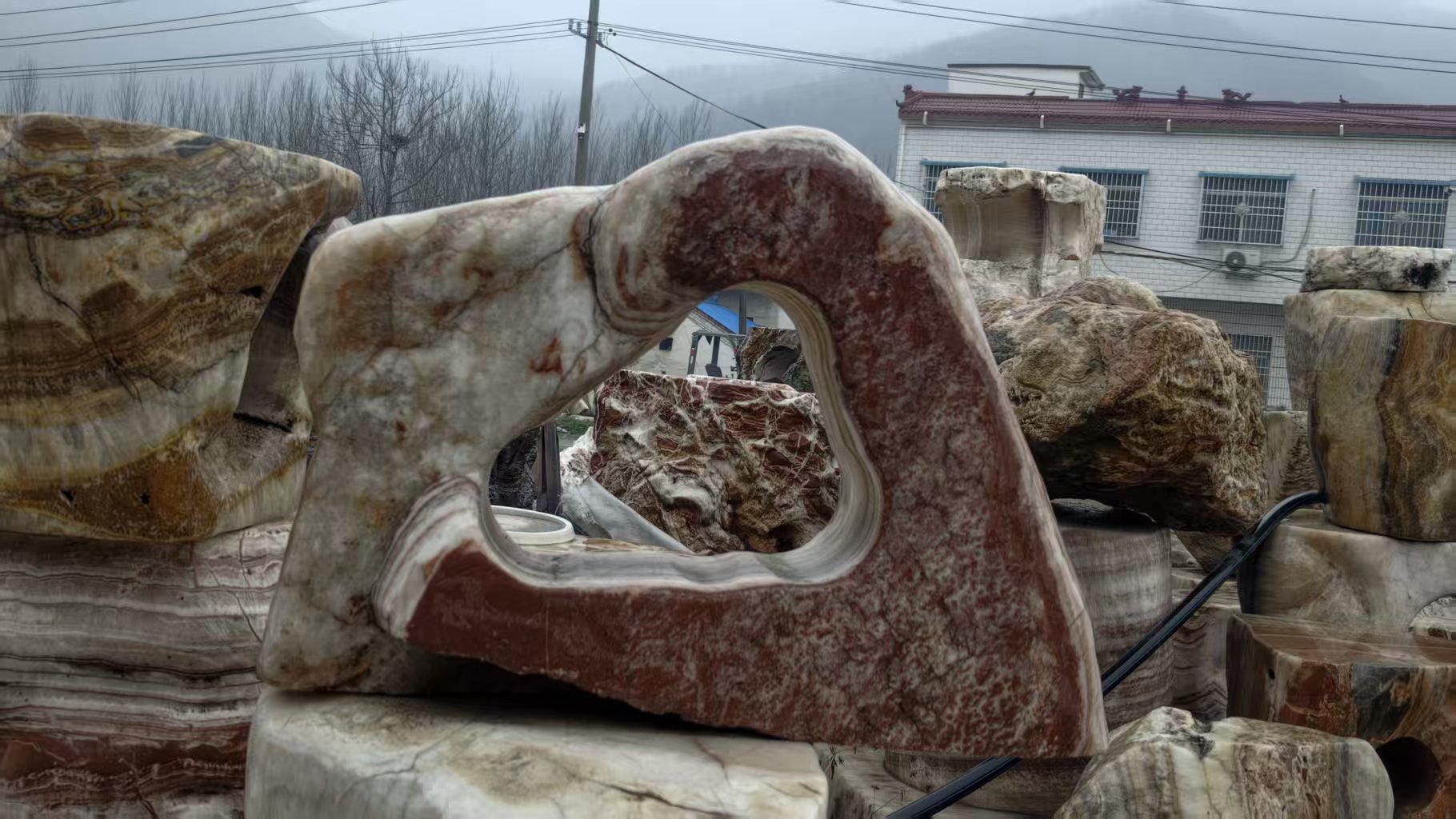 Natural stone with a broad opening
