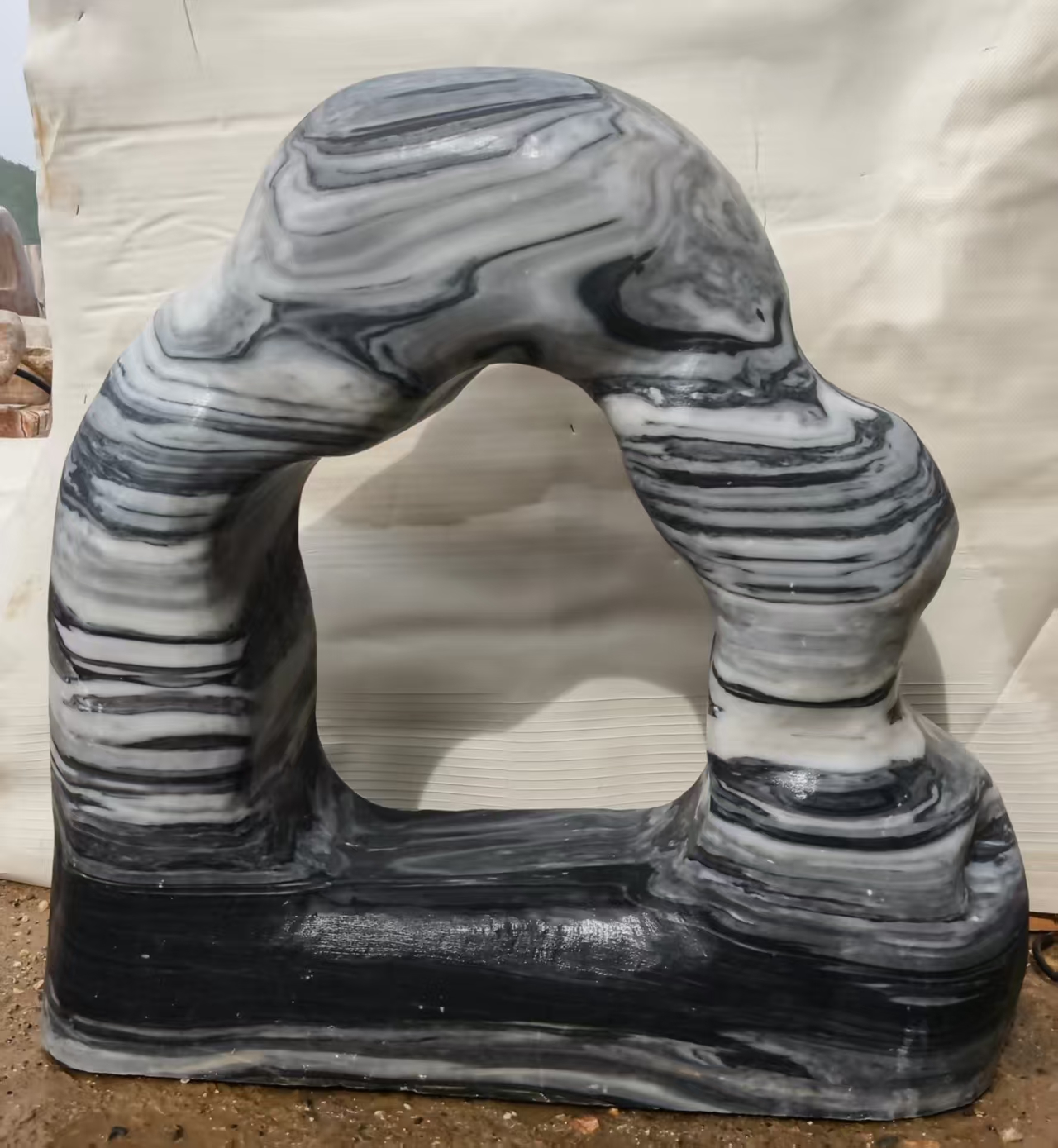 Grey striped stone arch