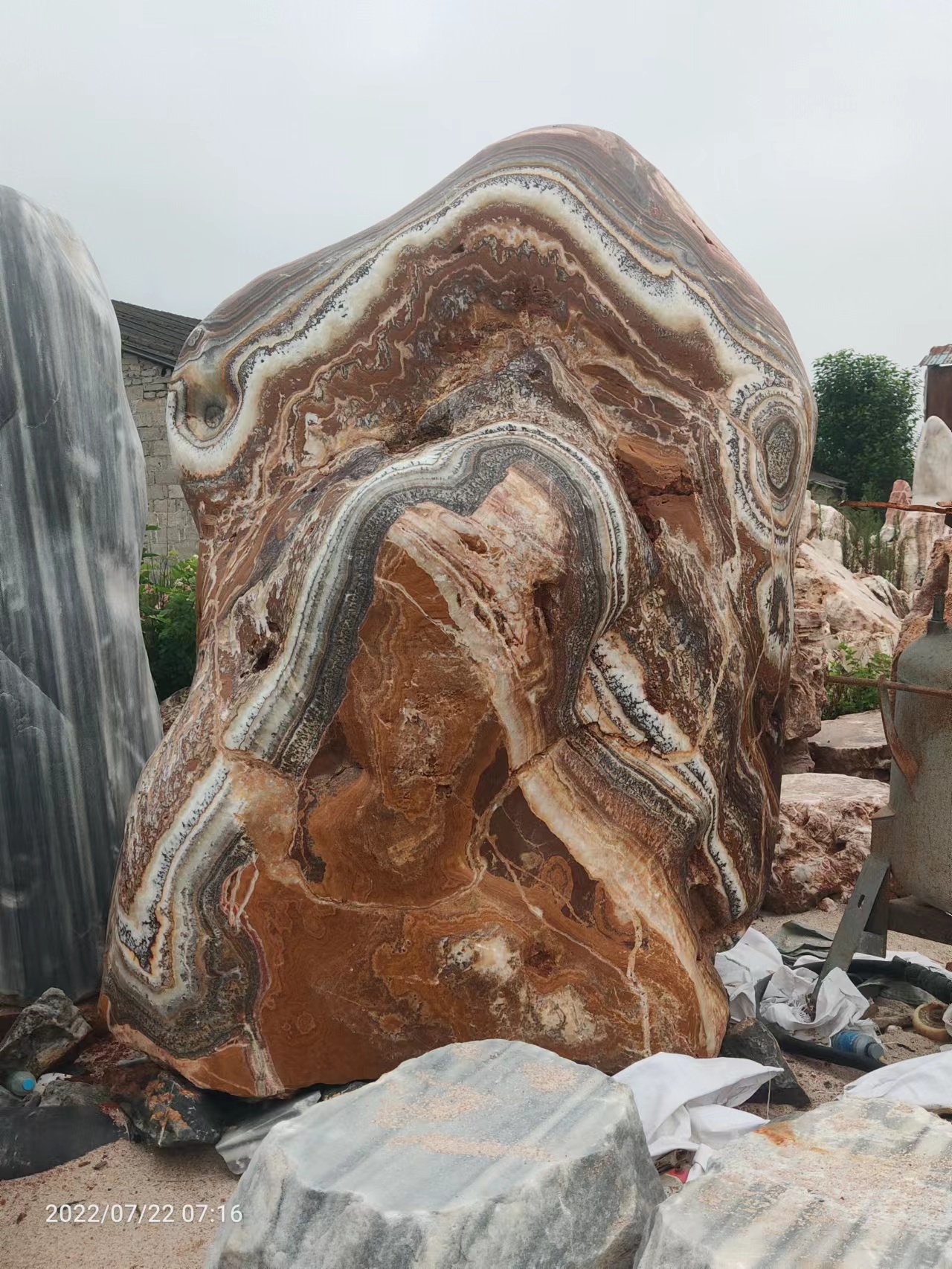 Banded stone with a sculptural profile