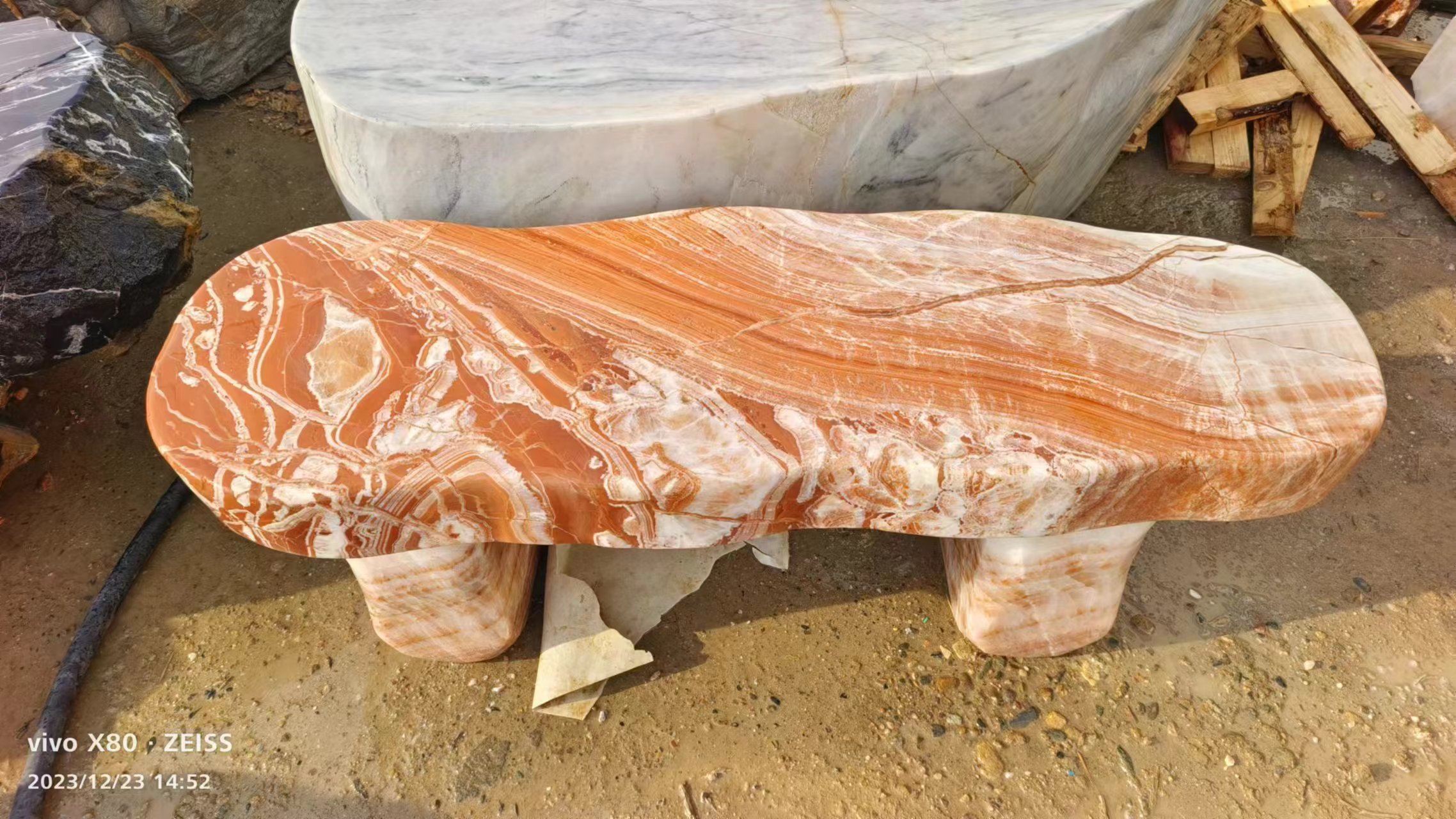 Warm-coloured bench with flowing veining