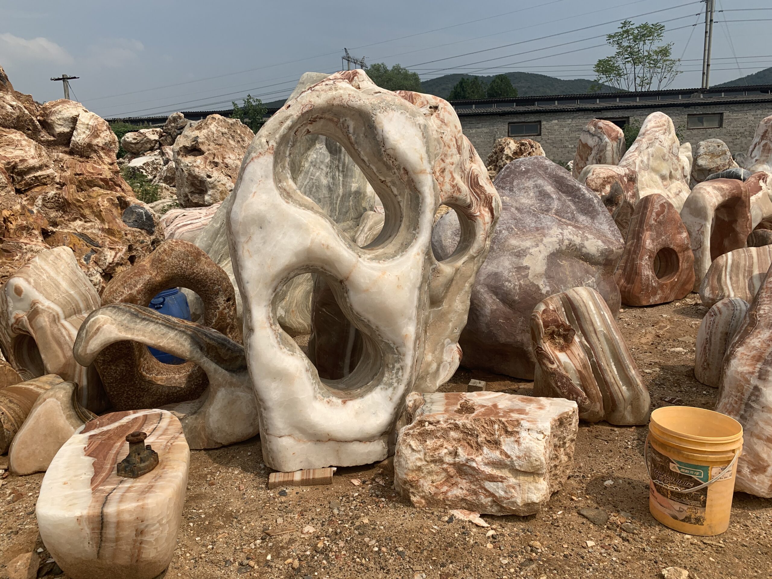 Sculptural stone with natural openings
