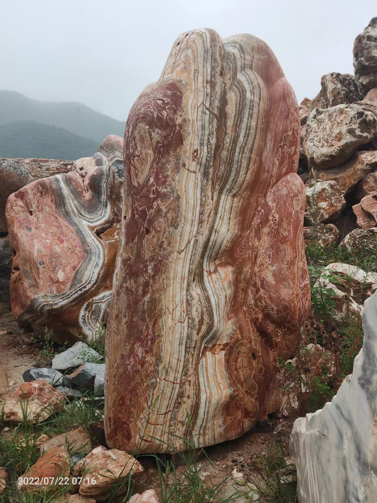 Red and cream standing stone