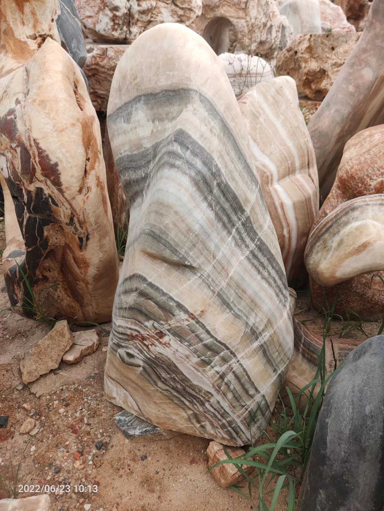 Pale banded standing stone